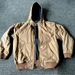 Large Carhartt jacket. New condition/never worn but was stored in smoking house